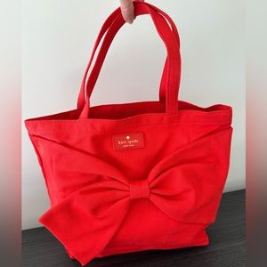 Red with a bid red bow-  Kate spade canvas tote